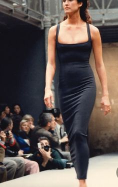 The perfect black dress from Alaïa's Spring Summer 1988 collection . Azzedine Alaïa gained his reputation by creating sleek dresses that hug the body, this dress is the ideal example of his iconic style. So chic. This stretch ankle-length dress has the most incredible fit - it hugs the body and it is so comfortable to wear. It is made from a stretch knit and features a low square neckline, beautiful open-work along the seamlines which gives the dress its feminine shape. The skirt is slightly ruc Vintage Alaia Dress, Alaia Dress, Azzedine Alaïa, Rare Dress, Knit Skater Dress, Vintage Runway, Sleek Dress, Azzedine Alaia, Knit Maxi Dress