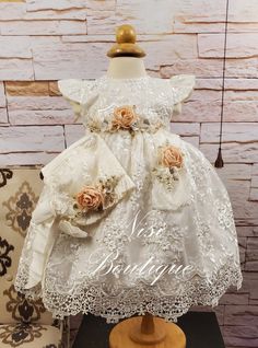 "★Ivory Christening Gown, Baptism Dress★ ★Occasion: Baptism, Child Blessing or any Special Occasion ★Comes With: Dress, Bonnet and Headband ★Measurements 3-6 Months, (Long 15\") (Waist 19\")  (Shoulder to Shoulder 8\") 12-18 Months, (Long 21\") (Waist 20\")  (Shoulder to Shoulder 8.5\") 2 Years, (Long 21.5\") (Waist 21\")  (Shoulder to Shoulder 9\") 3 Years, (Long 24\") (Waist 23\")  (Shoulder to Shoulder 9.5\") 4 Years, (Long 26\") (Waist 24\")  (Shoulder to Shoulder 10\") 6 Years, (Long 28\") (Waist 24.5\")  (Shoulder to Shoulder 10.25\") -Waist measurement is around ★Features: The back is open, for comfort when you load the baby (The waist is adjustable, has two ribbons to make a bow, as in the photo) Please check the measurements, and any questions send me a message,  your satisfaction Cream Baptism Dress For Ceremony, Cream Lace Baptism Dress For Pageant, Elegant Beige First Communion Dress, Elegant Beige Dress For First Communion, Fitted Cream Gown For Pageant, Fitted Cream Gown For Pageants, Elegant Cream Gown For Pageant, Cream Lace Pageant Gown, Cream Lace Gown For Pageant