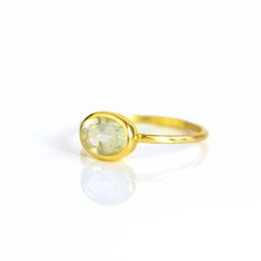 You'll fall in love with the light green coloring of this Green Amethyst ring. This is a perfectly sized oval to compliment any collection. Popular as a birthday gift for those February babes and Green Amethyst lovers alike. This is a light, transparent green gemstone with no flaws. This stone is beautifully faceted and bezel set in a 925 sterling silver band or plated with 18k vermeil gold. Gemstone is approximately 8 x 6mm.Band has 925 stamp on inside.Please note that each ring is handmade and Green Amethyst Ring, February Birthstone, Green Gemstones, Green Amethyst, February Birth Stone, Sterling Silver Bands, Amethyst Ring, Bezel Setting, Silver Band