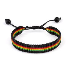 Embrace the vibrant spirit of Rastafarian culture with this handmade beaded bracelet. Crafted with meticulous attention to detail, each bead is carefully strung together to create a stunning blend of red, yellow, and green hues - the iconic colors representing the Rastafarian movement. This bracelet is not just an accessory, but a symbol of unity, love, and harmony. Adjustable to fit most wrist sizes, its a versatile piece that can be worn by both men and women. Whether youre a reggae enthusiast Adjustable Festival Bracelet With 108 Beads, Adjustable Bohemian Bracelet With 108 Beads, Adjustable Black Bohemian Beaded Bracelets, Hippie Hand-strung Friendship Bracelets With Round Beads, Hippie Hand-strung Beaded Bracelets For Festival, Hippie Braided Bracelets With Round Beads For Festivals, Hippie Festival Hand-strung Beaded Bracelets, Hand-strung Hippie Friendship Bracelet With Round Beads, Hippie Style Braided Beaded Bracelets