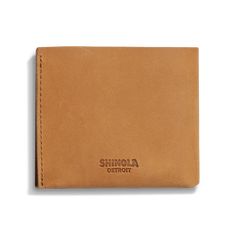 Built from premium USA Heritage leather and sewn in the United States, this might just be the last wallet you’ll ever need. Features an interior unlined bill pocket, six faille-lined card pockets, and two receipt pockets. | Shinola Men's Utility Bifold Wallet in USA Heritage Leather Classic Rectangular Wallet With Waxed Finish, Classic Waxed Trifold Wallet, Classic Waxed Finish Wallets For Everyday Use, Bifold Waxed Finish Wallets For Everyday Carry, Cognac Wallet With Rfid Blocking For Everyday, Classic Bifold Wallets With Waxed Finish, Cognac Rfid Blocking Wallet For Everyday, Brown Waxed Finish Wallet For Everyday Use, Brown Waxed Finish Wallet For Everyday