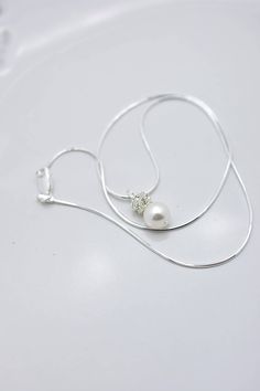 These 7 lovely necklaces feature genuine sterling silver snake chain in a shiny finish for an elegant look. An 8mm white Swarovski pearl (5 colors available) is topped with sparking silver-plated rhinestones and set on an 18 inch** necklace. Each comes in a gift box. Pearl available in white, ivory, light pink, light grey and dark grey. Matching earrings available here: www.etsy.com/listing/101323136/7-pairs-bridesmaid-earrings-7-pairs **IMPORTANT: Measures 18 inches but is also available in 16 Bridesmaid Necklaces, Necklaces Crystal, Necklaces Pearl, Bridesmaid Pearl Earrings, Single Pearl Necklace, Bridesmaid Pearls, Santa Fe Nm, Silver Snake Chain, Bridal Bracelet