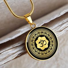 "This Om Lotus Mandala Necklace Is the Perfect Gift for all those yoga lovers, Whether for Yourself or a Loved One.  ➜ Our jewelry is made of high-quality surgical steel with a shatterproof liquid glass coating and an 18k gold finish option. ➜ Engrave onto the back of the Om Lotus Mandala pendant your loved one's name, your wedding date, an anniversary, or anything else you want to remember and keep you close to her heart. You can add 2 lines and each up to 20 characters long. Each personalized Om Pendant For Men, Earrings With Price, Pendant Jewelry Gold, Om Earrings, Om Mandala, Ohm Pendant, Indian Gold Necklace Designs, Gold Pendants For Men, Mens Wedding Rings Gold