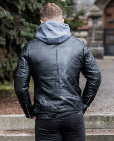 JERONE black faux leather jacket. Also suitable for colder climates, as the jacket has a black, warm faux hair lining. The jacket has a detachable hood, zipped pockets and neat biker padding. Zip fastening. Temperature scale 3/5. Hooded Leather Jacket With Padded Collar, Black Hooded Jacket With Detachable Hood For Urban Adventures, Black Biker Outerwear With Double-lined Hood, Edgy Black Hooded Leather Jacket, Hooded Biker Jacket For Cold Weather, Winter Outdoor Leather Jacket With Detachable Hood, Black Biker Leather Jacket With Double-lined Hood, Urban Faux Leather Biker Jacket For Winter, Black Faux Leather Biker Jacket For Winter