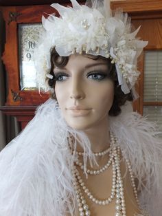 Floral wedding head peice cloche flapper wedding with veil. can be customized with the length of your veil. Many more pictures on fb- retrovintageweddings Vintage Gatsby Style Hat Headpiece, Gatsby Style Hat For Vintage Events, Vintage Wedding Headband Headpiece, Adjustable Flapper Wedding Headpieces, Vintage White Headpieces For Wedding, Vintage White Wedding Costume Hats And Headpieces, Vintage Wedding Headband, Vintage Fitted Headpieces For Wedding, White Vintage Wedding Costume Hats And Headpieces