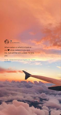 an airplane wing with the sky and clouds in the background that says, what matters is what's in front of you?