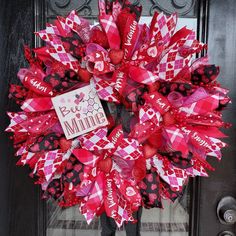 a valentine's day wreath on the front door