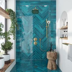 a bathroom with blue tiles on the shower wall and wooden stools in front of it