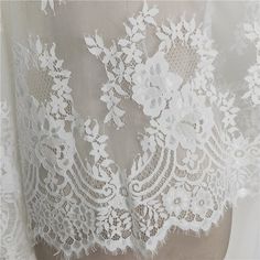 Beautiful Soft Eyelash French lace fabric This is a new style in high quality. It with Scalloped on both sides Great for make wedding dress, evening gown, Costume, cocktail dress Color: White Width - 59 inches, Length - 118 inches (3yards) This Listing Fabric is 3 yards Length It is fabric product, not include dress Wholesale acceptable, please convo me Shipping Time: United Sates: 10-15 working days United Kingdom:10-15 working days Canada: 10-15working days Australia: 10-15 working days Asia:4 White Lace Dress With Lace Patchwork, White Scalloped Lace Dress, White Lace Dress With Contrast Lace For Wedding, White Lace Dress With Scalloped Details, Cream Lace Dress With Scalloped Details, Cream Lace Dress With Delicate Details, Off White Lace Trim Wedding Dress, Off White Lace Dress For Wedding, Fitted Tulle Fabric With Lace Patchwork