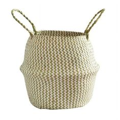 a white and brown basket with two handles