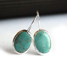 Oval-Cut Turquoise Silver Earrings; All my jewelry is handcrafted with pure and sterling silver.I ship my items well-cushioned, inside a bubble mailer in organza gift pouches or gift boxes, prettily packaged and perfect for gift giving. I also include a zipped bag for you so that you can safely store your jewelry when not in use♥Each stone has its own texture and color which differ slightly from one another. Your earrings will be one of a kind for I will be preparing a new one for you. The shini Artistic Turquoise Earrings For Gift, Single Turquoise Sterling Silver Earring, Turquoise Sterling Silver Earrings - Fine Jewelry, Nickel-free Turquoise Earrings For Gift, Silver Turquoise Earrings, Nickel-free Turquoise Crystal Earrings For Gift, Earrings Big, Earrings Turquoise, Bubble Mailer