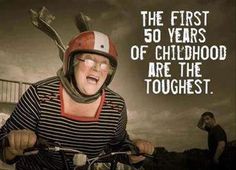 a person on a bike with a helmet saying the first 50 years of childhood are the toughest