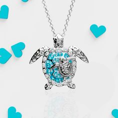 This beautiful pendant features a baby turtle resting on its mother's shell, showcasing the happiness of being together. With every purchase, you will not only own a stunning piece of jewelry, but also adopt and save your own sea turtle. Make a difference with your fashion choices and order now! Ocean-inspired Pendant Charm Necklace As Gift, Personalized Ocean-inspired Jewelry Gift, Silver Turtle Necklace For Gift, Spiritual Turtle-shaped Jewelry Gift, Spiritual Turtle Shaped Jewelry Gift, Silver Turtle Jewelry For Gifts, Sterling Silver Turtle Necklace For Gifts, Silver Turtle Jewelry Gift, Turtle Shaped Sterling Silver Jewelry Gift