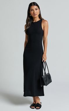 Stand out from the crowd in our Rodolphe Midi Dress. This playful and flirty little black dress is perfect for any occasion, whether you're dressing it up or down. The crew neck and sleeveless design adds a touch of casual coolness, while the ribbed jersey fabric gives it a comfortable and flattering fit. Made from high-quality polyester, this basic dress will become your go-to favorite for its versatility and style. Get ready to turn heads wherever you go in our Rodolphe Midi Dress! Product Det Style Basic, Basic Dress, Jersey Dress, Jersey Fabric, Polyester Material, Midi Length, Crew Neckline, Little Black Dress, Black Dress