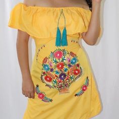 Handmade In Chiapas, Mexico The Embroidery Pattern & Colors Will Vary Due To The Handmade Nature Of The Dress. More Colors Available. The Dress Ties In The Back. Size Medium Measurements (Approximate): Length: 31 -32 Inches Armpit To Armpit: 21 Inches Size Large Measurements (Approximate): Length: 31 -32 Inches Armpit To Armpit: 22.5 Inches Size Xl Measurements (Approximate): Length: 34 Inches Armpit To Armpit: 25 Inches Material: Poplin Cotton Blend Bohemian Embroidered Dress For Summer, Bohemian Summer Embroidered Dress, Yellow Floral Embroidered Dress, Summer Folk Style Embroidered Fabric, Bohemian Floral Embroidered Fabric For Summer, Summer Festival Floral Embroidered Fabric, Summer Multicolor Embroidered Fabric, Yellow Embroidered Summer Dress, Yellow Summer Embroidered Dress