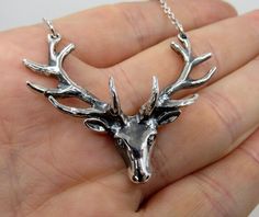 "Solid, sterling silver stag deer pendant.  Highly polished finish with oxidized details to give it a stunning vintage finish, bringing out the depth to the design (see pictures). Or available in plain silver (see video) Dimensions of pendant: Width 2\" Height 1.8\" Weight 14.5 grams Please check out my other designs and vintage pieces here: https://www.etsy.com/uk/shop/YouGotTheSilverUK  Click on customise for any custom queries or bespoke pieces." Stag Necklace, Stag Wallpaper, Stag Jewelry, Deer Pendant, Deer Necklace, Hand Cuff Bracelet, Stag Deer, Birthday List, Funky Jewelry