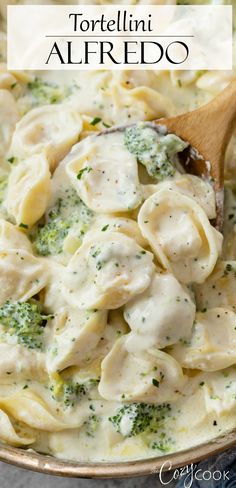 tortellini alfredo with broccoli and cheese in a skillet