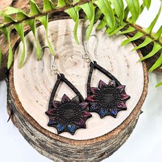 Add a pop of color to any outfit with our handcrafted Flower Dangle Earrings. Made with beautiful, multicolored American hardwood and hypoallergenic hardware, they're the perfect gift for any occasion. These handmade earrings measure:2 inches or 5.1 CM including hook. Multicolored - may have small batch color variation.