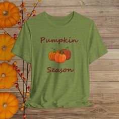 This Pumpkin Season tee is a classic unisex jersey short sleeve tee fits like a well-loved favorite. Soft cotton and quality print make users fall in love with it over and over again. These t-shirts have-ribbed knit collars to bolster shaping. The shoulders are tapered for a better fit over time. Dual side seams hold the garment's shape for longer.  .: Made with 100% Airlume combed and ring-spun cotton, a lightweight fabric (4.2 oz/yd² (142 g/m that is easy to layer, breathable. Perfect for active and leisure wear.  .: The retail fit that is perfect for casual and semi-formal settings. The crew neckline adds a classic, neat style that's perfect for accessorizing. .: Bella+Canvas manufactures all its products in the US and internationally in humane, no-sweat-shop, sustainable way and is par Tri-blend Graphic Tee For Fall, Fall Pre-shrunk Crew Neck T-shirt, Fall Crew Neck Pre-shrunk T-shirt, Fall Short Sleeve T-shirt With Text Print, Short Sleeve T-shirt With Screen Print For Fall, Casual Tri-blend T-shirt For Fall, Fall Graphic T-shirt With Slogan, Fall Graphic Tee With Slogan, Fall Letter Print Short Sleeve T-shirt