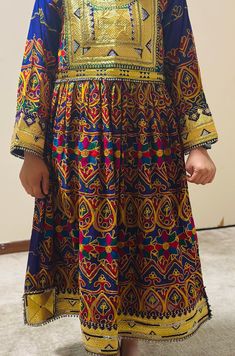 Afghan women's dress is a traditional handmade women dress called jawlie. It's made of Jawlie fabric, Zartar, rhinestones and jingle bells. Traditional Tunic Dress For Eid, Traditional Festive Tunic Dresses, Traditional Multicolor Long Sleeve Maxi Dress, Embellished Multicolor Embroidery Dress For Eid, Traditional Tunic Dresses For Festivals, Bohemian Dresses With Dabka Work, Traditional Tunic Maxi Dress For Festive Occasion, Multicolor Maxi Dress For Traditional Ceremonies At Eid, Multicolor Maxi Dress For Traditional Ceremonies During Eid