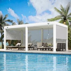 a large swimming pool with lounge chairs and palm trees