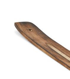 a wooden board with two pieces of wood sticking out of it