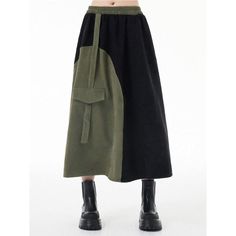 Discover Your New Favorite Skirt Step into the world of casual elegance with our Green & Black Asymmetric A-Line Skirt, a perfect blend of style and comfort for any season. Whether you're strolling through a spring garden or enjoying an autumn evening, this skirt's versatile design makes it an essential addition to your wardrobe. Product Features Size: One Size fits most, with a comfortable stretch from 26.8" to 44.9" at the waist. Length: Graceful mid-calf length at approximately 32.3 inches. M Autumn Evening, Cardigan Sweater Vest, Winter Layering, Patchwork Designs, Green Skirt, Spring Garden, Waist Length, Casual Elegance, Summer Tops