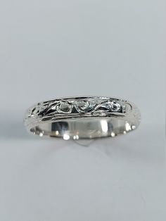 This stunning handmade/hand engraved unisex/any occasion band has been carefully crafted in solid 925 sterling silver. This beautiful band will not go unnoticed. Ring is size 8 1/2 but can be resized at no extra cost. A personalized message can be added to the inside of the ring such as your special date or any other message. All of my jewelry is handmade from scratch, one item at a time, as I like to produce a high quality piece. Ring will be shipped to you in an elegant gift box. A tracking sh Silver Ring Band, Silver Engraving, Engagement Bands, Silver Band Ring, Have A Blessed Day, Hand Engraving, Elegant Gift, Piercing Jewelry, Silver Band