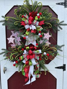 a christmas wreath hanging on the front door