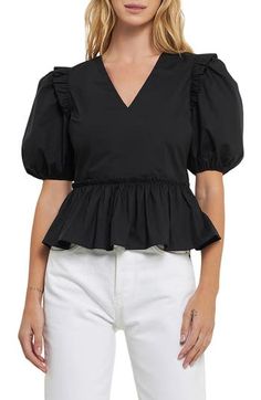 Ruffles on the shoulders enhance the puff sleeves of a charming cotton top made with more frill topping the gathered peplum. V-neck Short sleeves 100% cotton Hand wash, dry flat Imported Cotton V-neck Puff Sleeve Top For Work, Casual Tops With Ruffle Hem And Puff Sleeve, Cotton Puff Sleeve Top For Brunch, Cotton V-neck Puff Sleeve Top For Brunch, Fitted Cotton Peplum Top With Ruffle Hem, Fitted Cotton Puff Sleeve Top With Ruffles, Chic Cotton Peplum Top With Puff Sleeves, Spring Cotton Peplum Top With Puff Sleeves, Cotton Puff Sleeve Top With Ruffle Hem For Spring