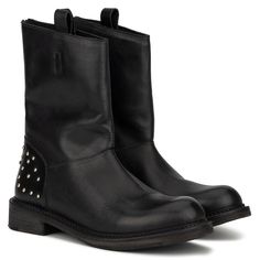 Give your winter style a sophisticated touch with the edgy details of the Stacy boot. Pull-on style with pull loop for easy on and off. The upper shows off a burnished leather look with a studded panel at the heel for a unique touch. Traditional round toe and short stacked heel. Winter Punk Moto Boots With Reinforced Heel, Punk Moto Boots With Reinforced Heel For Winter, Punk Style Moto Boots With Reinforced Heel For Winter, Edgy Leather Boots For Winter, Punk Leather Boots With Reinforced Heel, Punk Leather Ankle Boots, Edgy Winter Ankle Boots, Black Calf Leather Boots With Rivets, Rugged Winter Ankle Heeled Boots