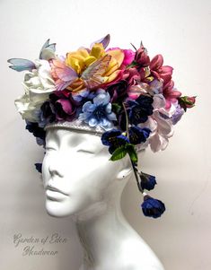 This headdress is hand made with the highest quality RealTouch flowers and 3D silk butterflies to give it the perfect fairytale touch. It is designed on a sturdy white sinamay cap that fits most adult heads, and is also equipped with an adjustable elastic strap to allow for a secure fit. This piece is crafted for both wearing and displaying, and is intended for long-term use.  All of our pieces are designed with attention to detail-they are delicate, so handle with care! **Please read all of our Elegant Adjustable Flower Costume Hat, Handmade Adjustable Cap-style Costume Headpieces, Flower-shaped Adjustable Headpiece For Races, Flower Headdress Floral Headpiece, Elegant Flower-shaped Adjustable Costume Hat, Floral Headdress, Bozeman Mt, Real Touch Flowers, Lace Ribbon