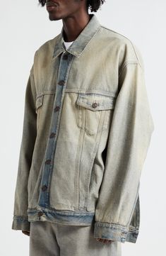 Balenciaga puts its signature avant-garde spin on the streetwear-staple trucker jacket in this oversized version cut from washed denim for an inside-out effect. 30 1/2" length (size 2) Front button closure Spread collar Button cuffs Chest button-flap patch pockets; side-seam pockets 65% polyester, 35% cotton Machine wash, line dry Made in Italy Designer Clothing Oversized Cotton Denim Jacket For Streetwear, Oversized Distressed Cotton Denim Jacket, Distressed Relaxed Fit Outerwear For Streetwear, Acid Wash Relaxed Fit Denim Jacket, Oversized Light Wash Outerwear For Streetwear, Urban Style Acid Wash Cotton Denim Jacket, Oversized Faded Washed Outerwear, Spring Stonewashed Outerwear For Streetwear, Faded Urban Denim Jacket In Relaxed Fit