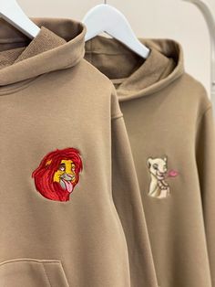 Couple embroidered hoodies, sweatshirts with Lions from the cartoon. It's a creative idea for Anniversary, New Year, Christmas or Birthday gift. ------------------------------------------------------  • ORDER INFORMATION  • 1) You can see the price for 1 item in the listing.  2) To order the couple set - put 2 items with their individual parameters to the cart separately, please. Also, you can order just one item - leave a note about the chosen picture to the order.  3) Put the clothes to the ca Hooded Hoodie With Machine Embroidery For Streetwear, Cotton Hoodie With Machine Embroidery, Long Sleeve Hoodie With Embroidery For Streetwear, Long Sleeve Hoodie With Machine Embroidery For Streetwear, Long Sleeve Embroidered Sweatshirt For Streetwear, Long Sleeve Sweatshirt With Machine Embroidery For Streetwear, Hooded Sweatshirt With Machine Embroidery For Streetwear, Matching Crewneck, Idea For Anniversary