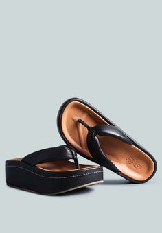 Soft rich genuine leather thong sandal with mid-height platform seems to be an evolving design this decade. The minimal style which transcended home and loungewear styles now finds out roads to the high streets. Molded footbed settles along the feet well and keeps it at absolute comfort. Type: Sandal Heel Type: Platform Upper Material: Genuine Leather Lining: Genuine Leather Outsole: Rubber Open Round Toe Handcrafted Shoe Street Style RCSH2395 Loungewear Fashion, Leather Thong Sandals, Sandal Platform, Toddler Boy Shoes, Boot Jewelry, Leather Pieces, Thong Sandals, Top Shoes, Dream Shoes