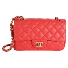 Listing Title: Chanel Coral Quilted Lambskin Mini Rectangular Classic Flap Bag SKU: 124077 Condition: Pre-owned Handbag Condition: Mint Condition Comments: Plastic at some hardware. Scuffing and discoloration at straps. Faint corner scuffing and throughout exterior. Scratching and tarnishing at hardware. Light interior scuffing. Final sale. Brand: Chanel Model: Classic Flap Origin Country: France Handbag Silhouette: Crossbody Bag;Shoulder Bag Occasions: Evening;Fall/Winter;Spring/Summer;Wedding; Coral Quilt, Chanel Double Flap, Chanel Crossbody, Spring Summer Wedding, Country France, Classic Flap Bag, Pink Handbags, Chanel Model, Classic Flap