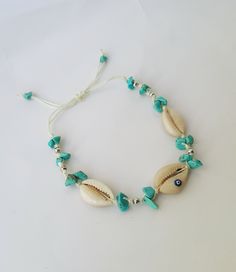 ------♥ ♥ ♥ bohomila ---- bohomian sea shell anklet ♥ Natural sea shell 1)-------♥ Seed bead boho anklet 9 inch +1 inc extender chain 2)-------♥Natural sea shell and turquoise bead adjustable anklet ♥ Gold plated chain and lobster claw ♥ anklet is handmade FOR MORE Anklet, check out our shophttps://www.etsy.com/shop/bohomila?ref=search_shop_redirect Thank you for looking through our shop. If you have any further questions feel free to message me! Stay beautiful lovelies. Bohemian Turquoise Bracelets For Summer, Bohemian Beach Season Bracelet Jewelry, Turquoise Beaded Bracelets For Beach In Hippie Style, Bohemian Strand Bracelets For Beach Season, Turquoise Bohemian Beaded Bracelets For Summer, Bohemian Anklets For Beach, Blue Bracelet Anklets For Beach, Bohemian Shell Bracelet For Vacation, Handmade Turquoise Anklet Bracelet