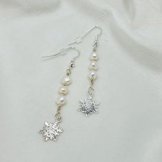 Our Snowflake Earrings of Sterling Silver Snowflakes, Sterling Silver Beads and Freshwater Pearls are elegant and classic. They look fabulous paired with our Callie Necklace and Callie Bracelet. This is a limited edition. Black Pearl Bracelet, Snowflake Pendant, Snowflake Earrings, Silver Snowflakes, Dog Necklace, Sterling Silver Drop Earrings, Jewellery Uk, Silver Drop Earrings, Silver Accents