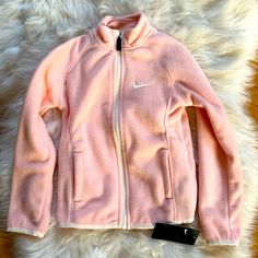 Nwt. Never Worn Sporty Fleece Jacket With Cozy Fit, Sporty Spring Outdoor Fleece Jacket, Sporty Cozy Fit Fleece Jacket, Pink Long Sleeve Sweatshirt For Outdoor, Nike Long Sleeve Sweatshirt With Fleece Lining, Nike Cozy Sports Outerwear, Cozy Nike Sports Outerwear, Pink Sweatshirt For Outdoor Fall Activities, Sporty Cozy Fit Long Sleeve Fleece Jacket