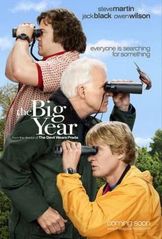 the big year movie poster with two people looking through binoculars