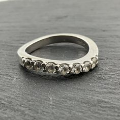 Vintage Cubic Zirconia Sterling Silver Half Eternity Ring, UK Size P, US Size 7 1/2, EU Size 55 1/4, Stamped 925, Front Width 2.6mm, Weight 3.70 Grams, Lovely Condition Silver Oval Diamond Ring With Half Eternity Band, Oval Silver Diamond Half Eternity Ring, Modern Crystal Ring With Diamond Accents For Anniversary, Modern Rings With Round Stone For Anniversary, Modern Crystal Ring With Prong Setting, Modern Crystal Ring With Vvs Clarity For Anniversary, Modern Eternity Band With Single Cut Diamonds For Anniversary, Modern Crystal Ring With Diamond Accents, Modern Channel Set Eternity Band For Anniversary