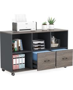 an office desk with two drawers and a printer on the top shelf next to it