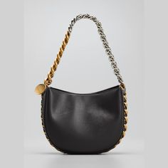 Stella McCartney shoulder bag in faux-leather. Two-tone chain shoulder strap woven onto bag; hanging engraved charm. Detachable, adjustable shoulder strap, 22.6" drop. Open top with snap closure. Interior, one slip pocket. Approx. 6.9"H x 8.5"W x 2.8"D. "Frayme" is made in Italy. Chic Hobo Shoulder Bag With Chain Strap, Modern Shoulder Bag With Chain Strap, Luxury Shoulder Bag With Chain In Crossbody Style, Designer Shoulder Bag With Chain Detail, Designer Shoulder Bag With Chain, Luxury Chain Shoulder Bag Crossbody, Luxury Chain Crossbody Shoulder Bag, Luxury Chain Shoulder Crossbody Bag, Leather Hobo Bag With Chain Strap