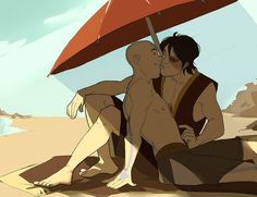 two people are sitting under an umbrella on the beach, one is kissing the other