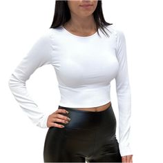 Show off your style with this ribbed crop top! With its soft, ribbed fabric and crew neck, you'll always look cool and be comfortably fashionable. Pair with our High Waist PU Leather Legging. Also available in more colors. Shop more tops & basics!! Model is 5' 3". White Long sleeves Ribbed fabric Cropped Seamless Fitted Crew neckline One size fits most 92% Nylon / 8% Spandex Still not sure which size to get? Ask one of our stylists! Please give us a call at 856-452-5821 during our regular busine Solid Color Crop Top For Fall, Solid Ribbed Stretch Top, Ribbed Solid Stretch Tops, Stretch Solid Ribbed Top, Solid Stretch Ribbed Tops, High Stretch Solid Color Crop Top For Spring, Ribbed Fitted Crop Top, Trendy Crop Top For Fall, Trendy Solid Color Crop Top For Fall