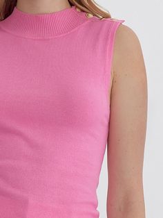 Add a touch of quirkiness to your wardrobe with the LYDIA HIGH NECK SLEEVELESS TOP. Featuring button detail at the shoulder and available in three fun colors, this knit top is perfect for those who don't take themselves too seriously. Style with your favorite jeans for a unique and fun outfit. 100% Nylon See size chart in photos. Pink Ribbed Fitted Knit Top, Fitted Pink Ribbed Knit Top, Fitted Ribbed Pink Knit Top, Casual Turtleneck Tank Top For Spring, Stretch Knit High Neck Tops, Stretch Knit High-neck Tops, Trendy High Neck Pink Top, Pink Sleeveless Knit Tops, Chic Stretch Pink Knit Top