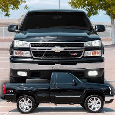 a black pickup truck parked in a parking lot