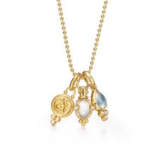 Looking for an all-in-one Temple signature piece? This charming necklace has everything–– a rock crystal amulet, a Blue Moonstone pendant, and an angel charm all layered together on a delicate beaded chain. The chain fastens at two lengths and is finished with our classic Temple charm. Product Details 18K gold Natural rock crystal Blue moonstone (1.20cts) Diamond (0.14cts) Length: 16.0" with 2.0" extender, Moonstone: 7x13mm/0.2"x0.5", Amulet: 7mm/0.2", Angel: 9x13mm/0.3"x0.5" Imported Crystal Amulet, Board Party, Xmas Wishlist, Diamond Chain Necklace, Amulet Charm, Wishlist 2024, Horseshoe Pendant, Horseshoe Necklace, Signature Necklace