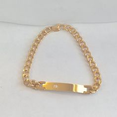 Stainless steel bracelet gold plated, can be engraved with name or saying of your choice No Return or Exchange on engraved item. Please contact with any concerns Gold Charm Bracelet With Chain As A Gift, Elegant Stainless Steel Nameplate Bracelet, Elegant Curb Chain Jewelry For Personalized Gift, Personalized Gold Metal Bracelets, Elegant Jewelry With Curb Chain For Personalized Gift, Classic Name Bracelet With Curb Chain As A Gift, Personalized Yellow Gold Metal Bracelets, Elegant Personalized Curb Chain Jewelry, Personalized Yellow Gold Metal Chain Bracelet