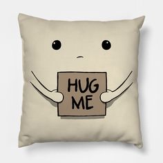 a pillow with the words hug me on it